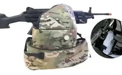 KET JJ249 Brass Catcher mounted on M249 machine gun